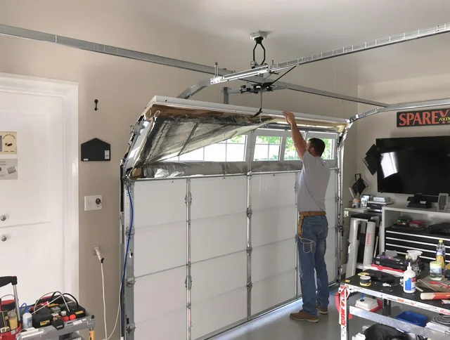 Garage door section replacement by Willimantic Garage Door Repair in Willimantic